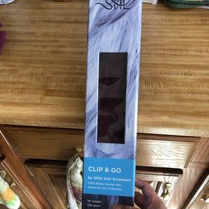 Magenta/red hair extensions